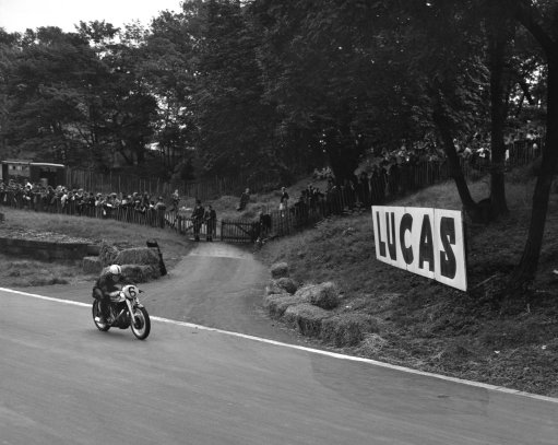 Norton bike being ridden to race glory in the 1950s