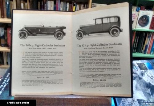 Open Classic Car Book on Desk