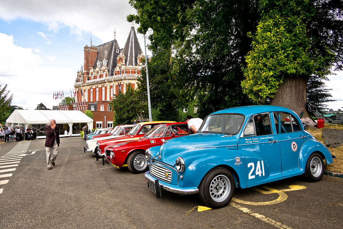 Lineup of classic cars outside the Chateau