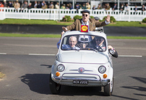 John Surtees and Erik Bonino share a Shell vintage car at Goodwood Shell vintage car