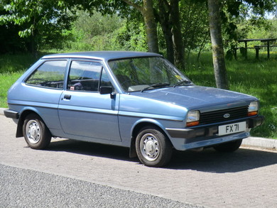 Classic blue Ford Fiesta