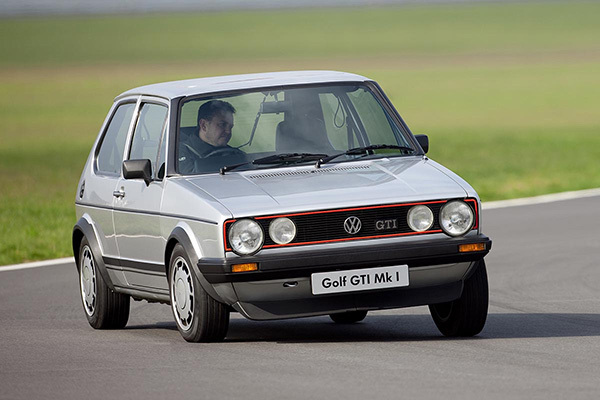 Silver 1976 83 Golf Gti On A Racetrack