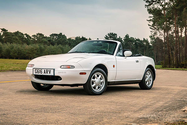 White convertible Mazda MX5