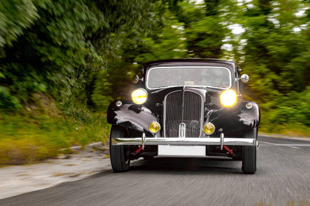 Vintage car on a country lane