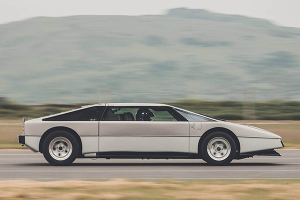 Silver grey aston martin bulldog being speed tested