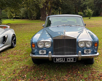 blue-rolls-royce-silver-shadow-on-grass-at-chateau-impney