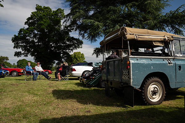 White Mercedes And Series 3 Soft Top Land Rover