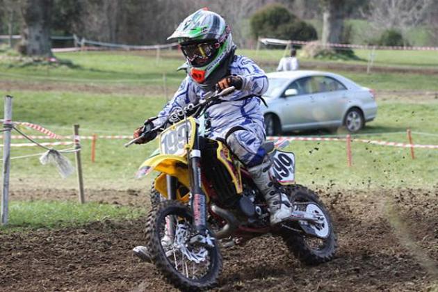 2002-to-2023-suzuki-rm85-motorcross-bike-on-a-muddy-track