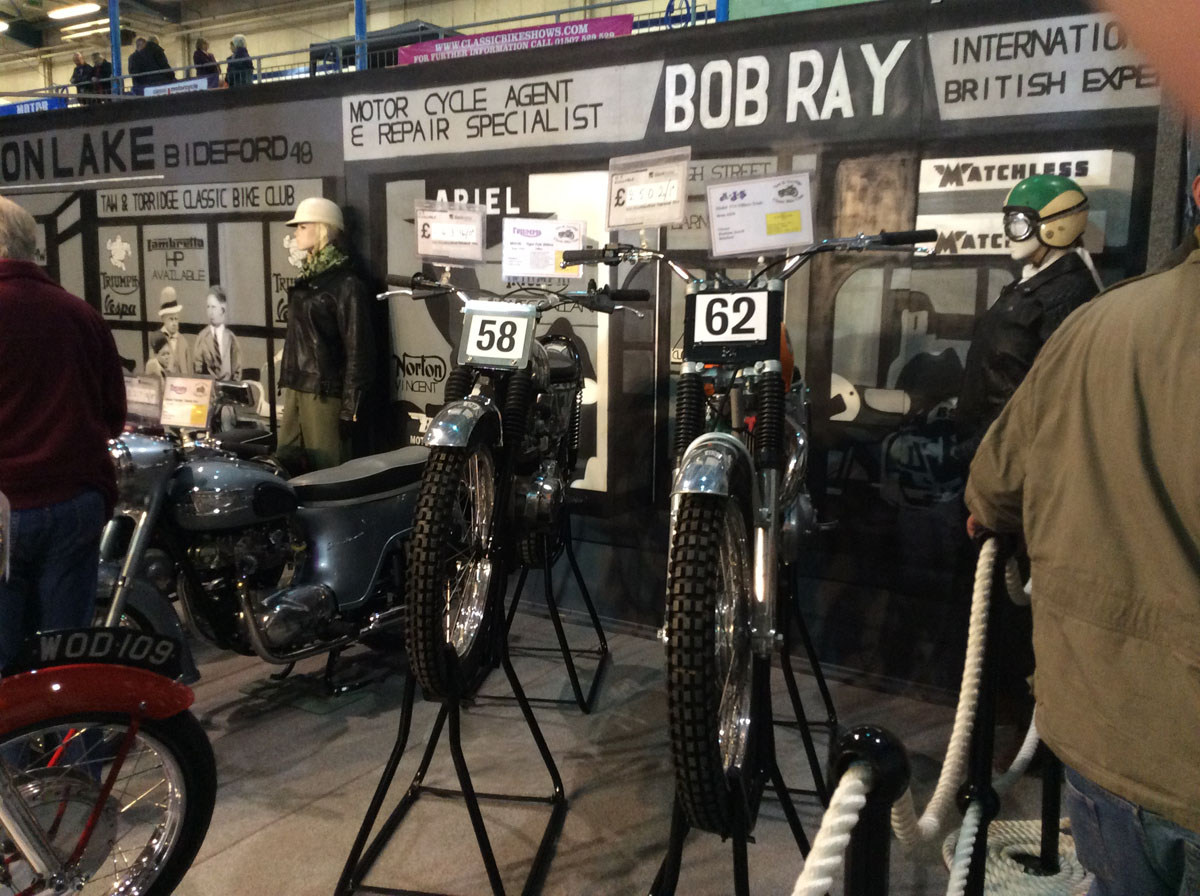 Two motorcycles on stands