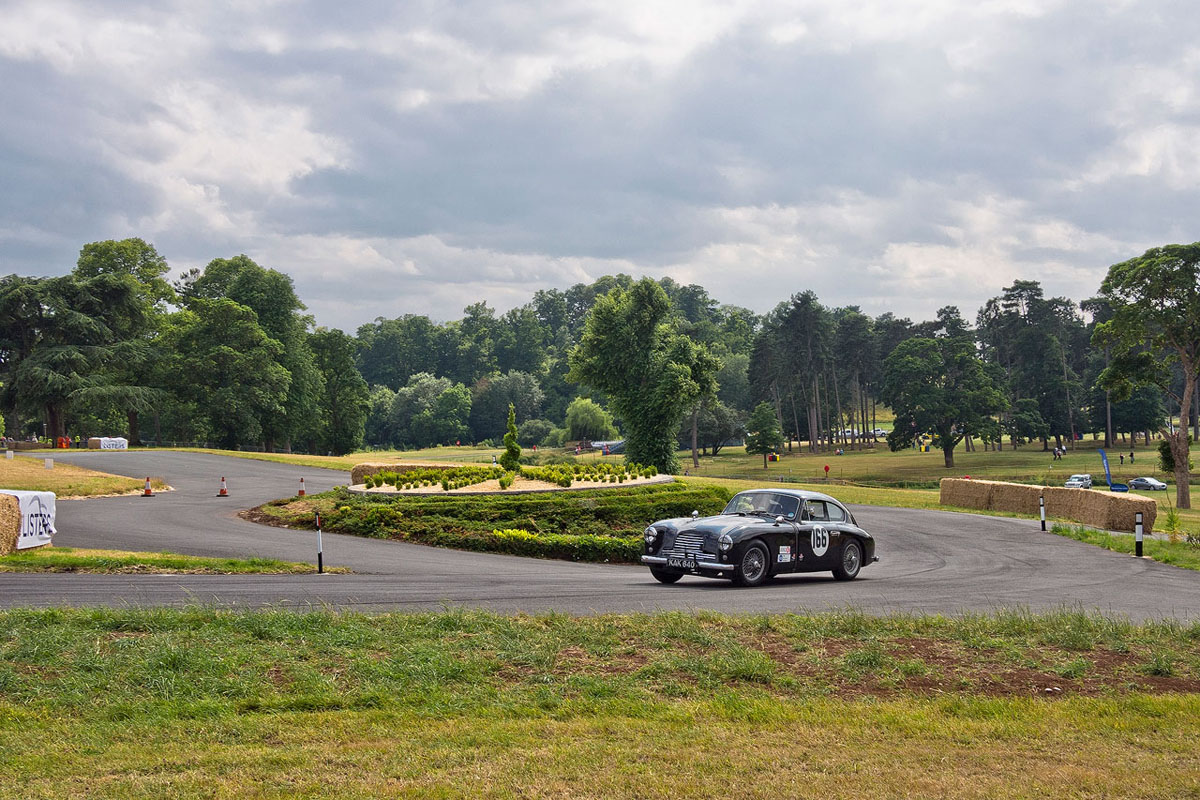 1954 Aston Martin winds round the hill climb