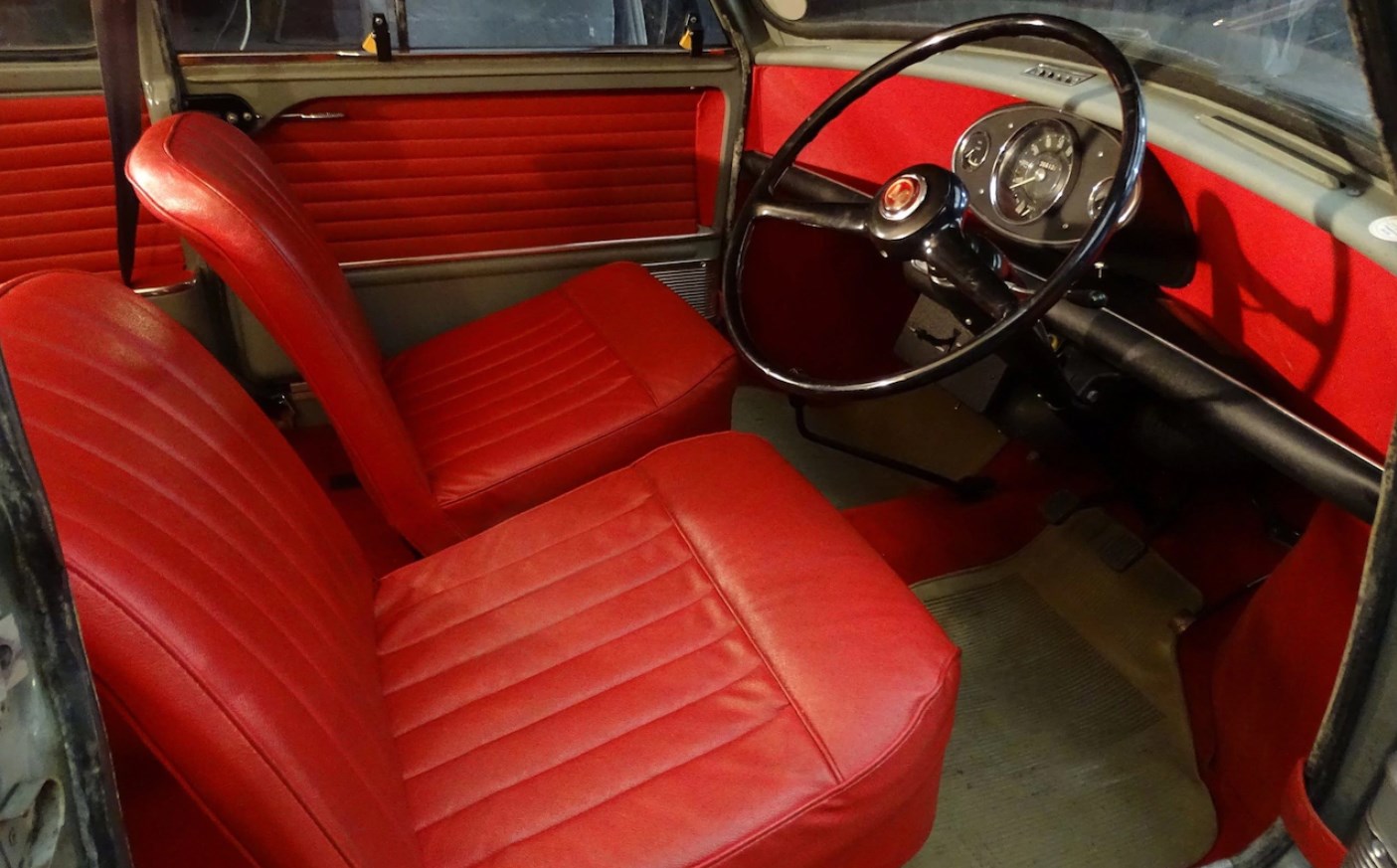 Red interior of Green classic Mini