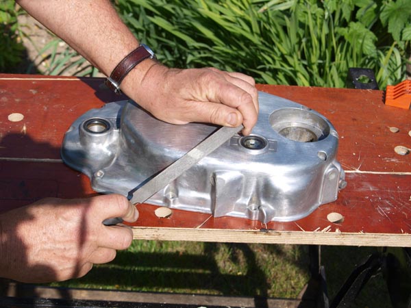 Man using a second cut file on Yamaha side case