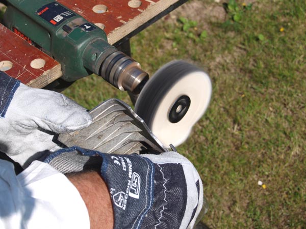 Man polishing metal