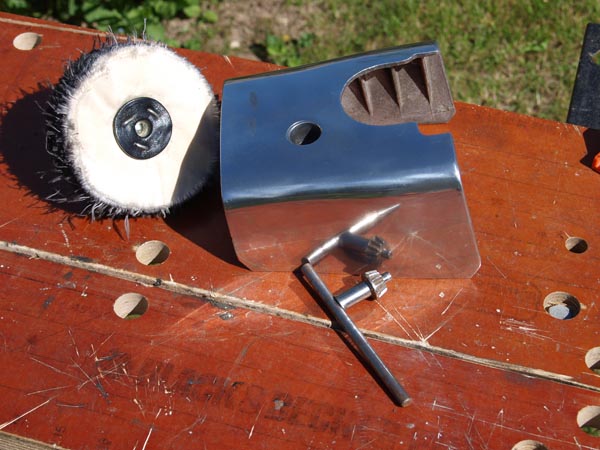 alloy and mop sitting on workbench