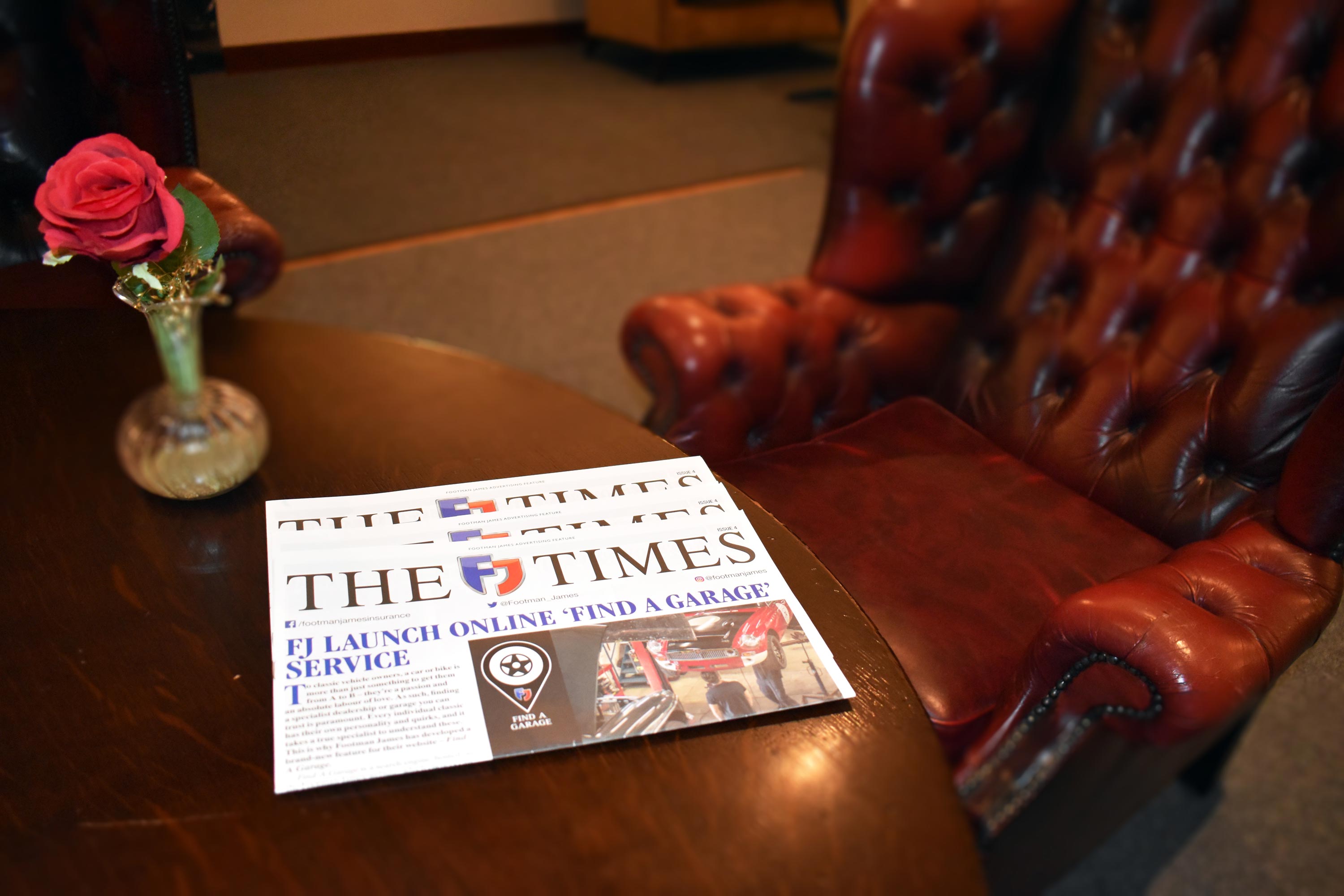 FJ Times Newspaper on a table with a rose