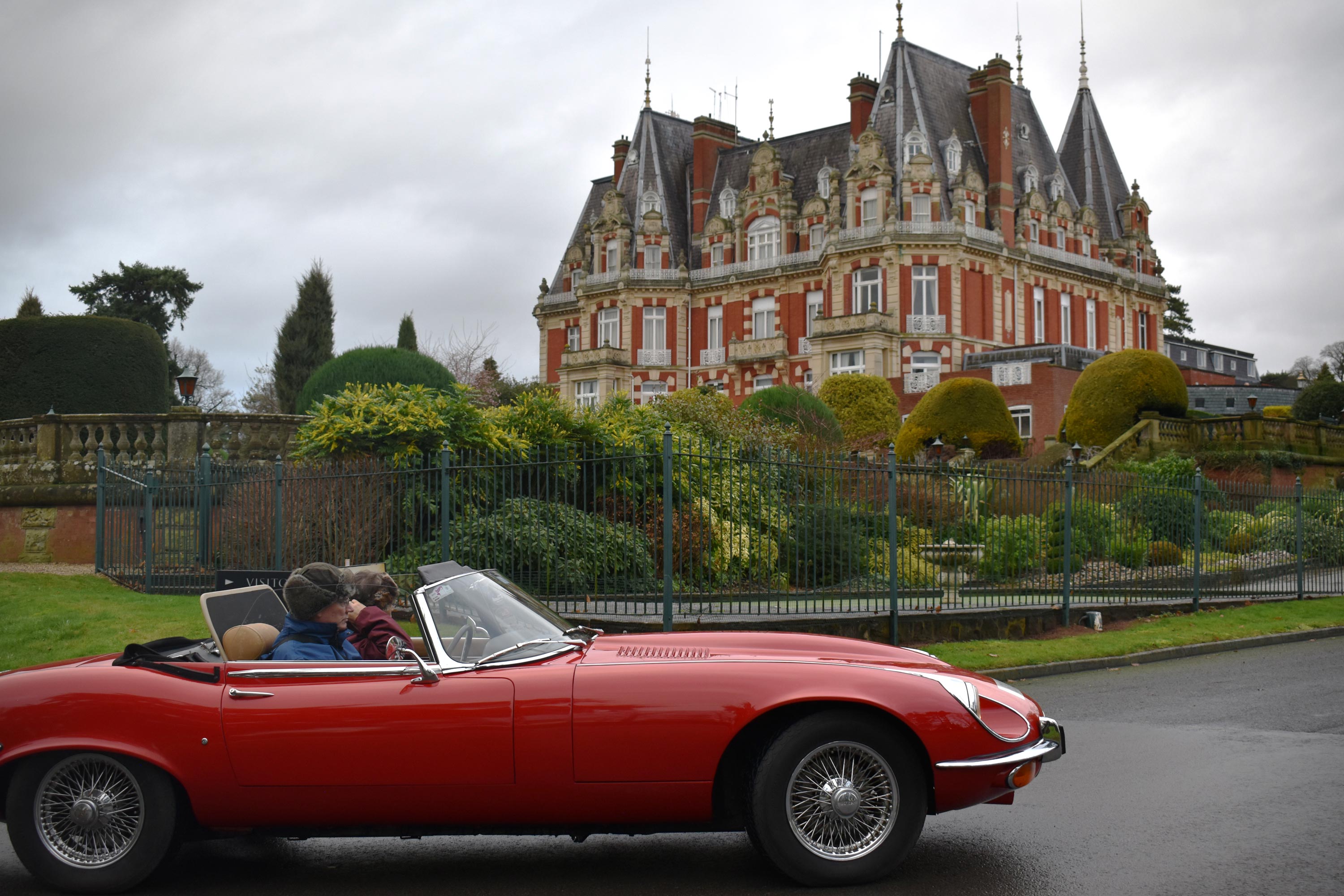 Red car arriving at Chateau Impney