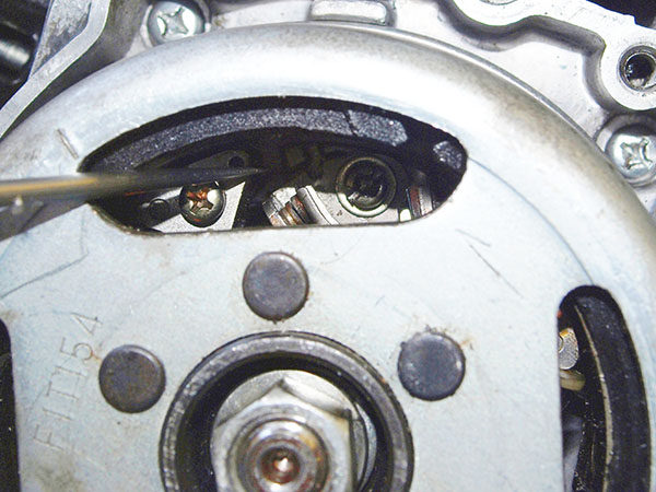 Close up of screw point in to the flywheel