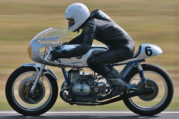 1978 To 1980 White Bmw R100t Motorbike On A Racing Track