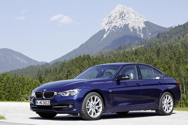 Dark Blue 2004 - 2013 BMW 3 Series E90 Guffert Austrian mountain backdrop