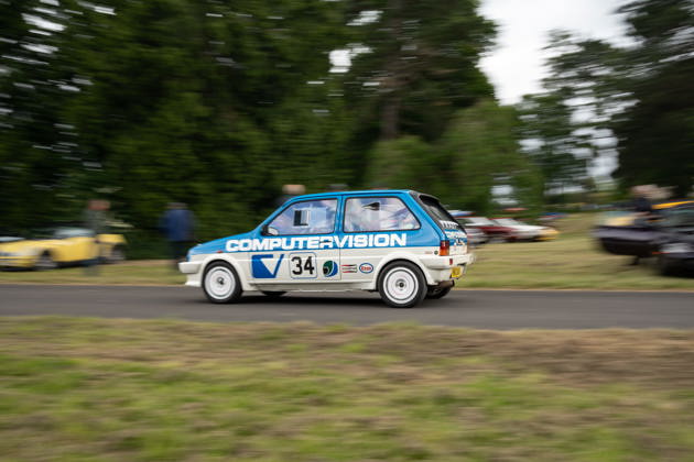 A modified classic car on a track