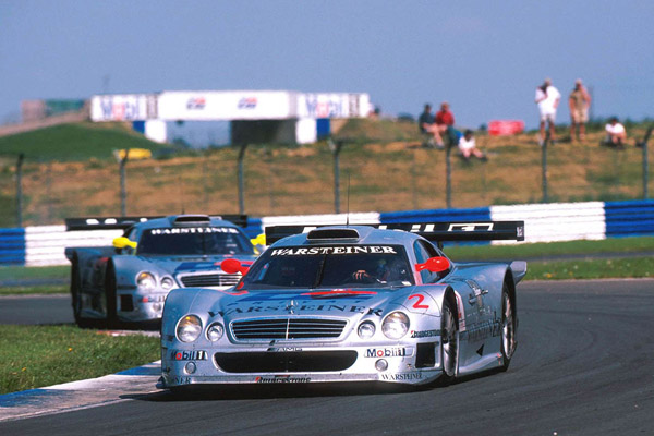 Two Silver 1998 Mercedes CLK GTR On Race Track Courtesy of Motorsport Images