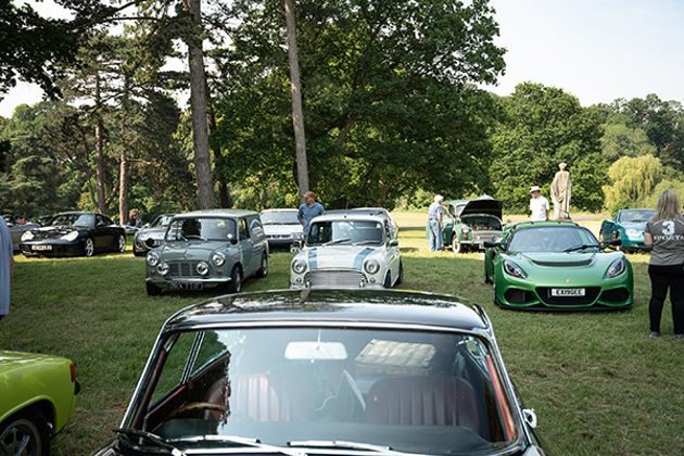 grey-classic-mini-coopers-and-light-blue-with-white-stripes-green-lotus-black-porsche-on