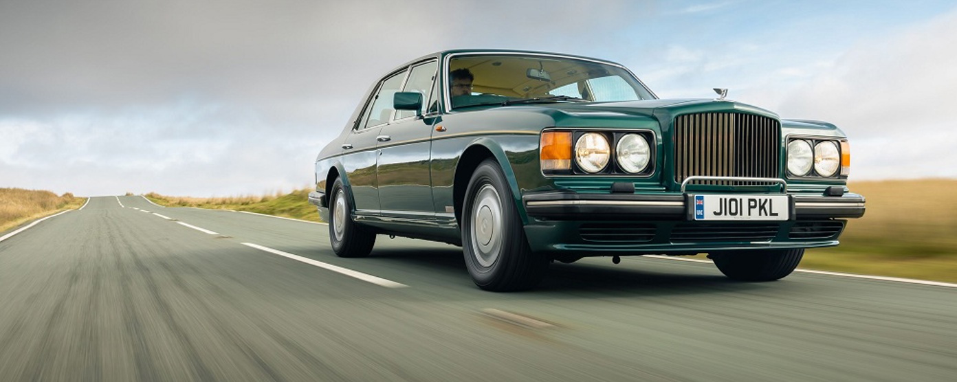 Bentley Turbo R driving along a road