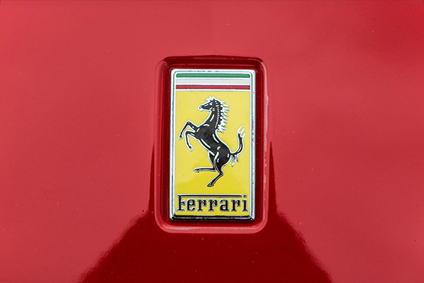 Ferrari Logo Hood Badge on a red bonnet