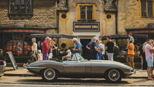 Classic car outside a country pub