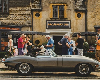 Classic car outside a country pub