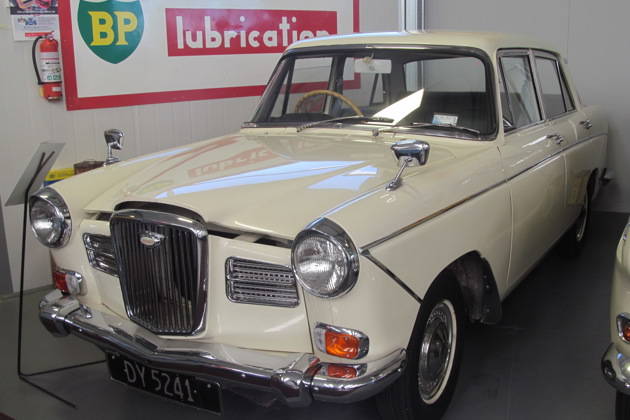 A white Wolseley in a showroom
