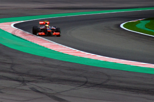 2010 Lewis Hamilton Mclaren driving a Mp4 25