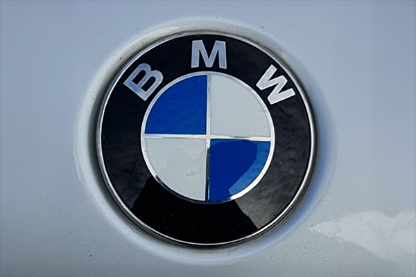 BMW Logo Hood Badge on a white bonnet