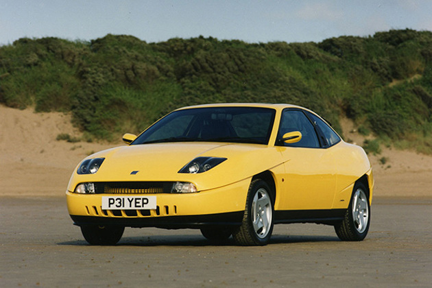 yellow-fiat-coupe-by-green-sand-dunes