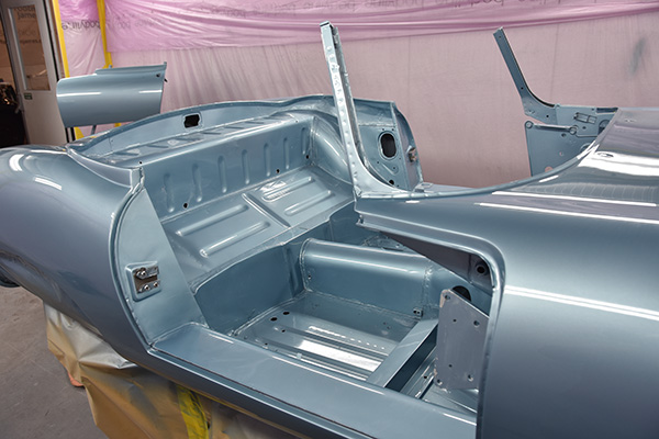 Powder blue Jaguar E Type in chassis
