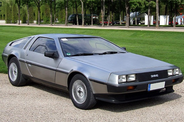 A Delorean parked in front of a neat lawn