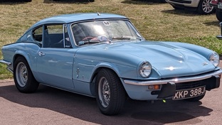 A light blue Triumph GT6