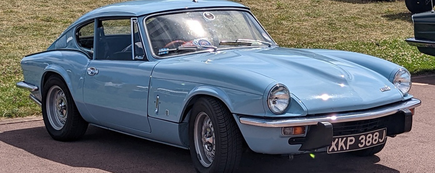 A light blue Triumph GT6
