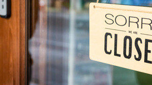 header-sorry-we-are-closed-sign-on-glass