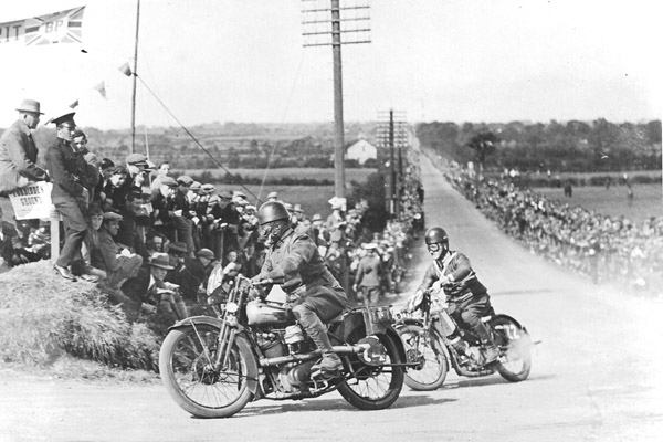 A Silver Tanked Brough Superior ss100 turning an bend in the 1927 Ulster Prix