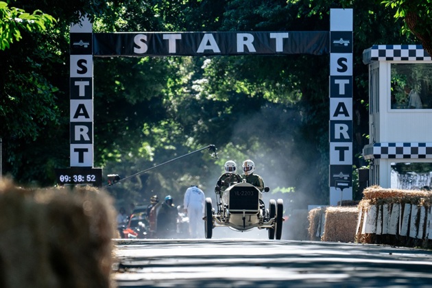 A car crossing the start line at The Goodwood Festival of Speed race