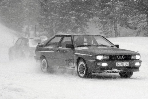 monochrome-1980s-audi-quattro-4wd-racing-in-snow