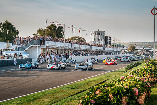 Variety Of Chevrolets Passing The Spectator Stand And Tower At Goodwood Revival