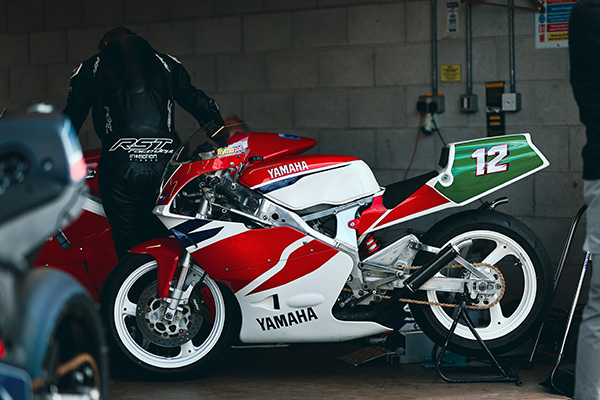 White Red Green 1988-1991 Yamaha TZ 250 in a garage, picture Courtesy Classic Bike Track day