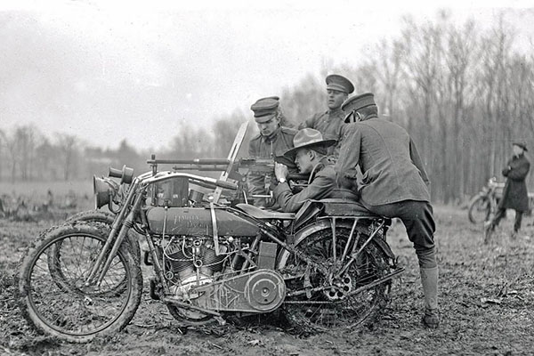 Monochrome Ww1 Us Army Harley Davidson Model 17 Fj Motorbike With A Side Car Mounted With A Springfield Machine Gun With Soldiers In A Muddy Field