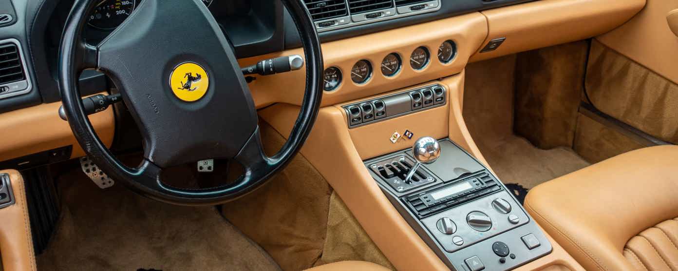 Ferrari interior with orange seats
