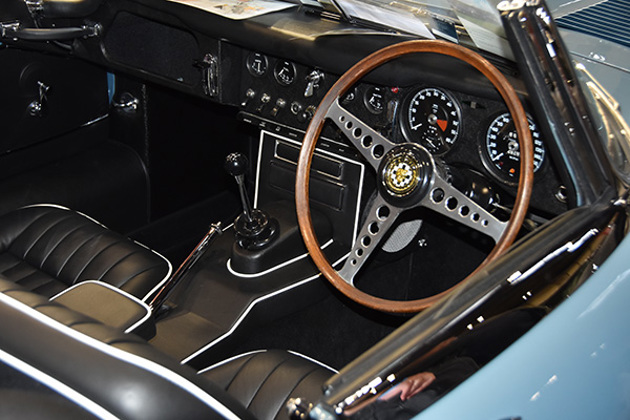 opalescent-silver-blue-jaguar-e-type-seats-and-steering-wheel