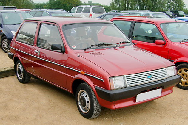 red-1980-1998-austin-mini-metro-in-a-car-park