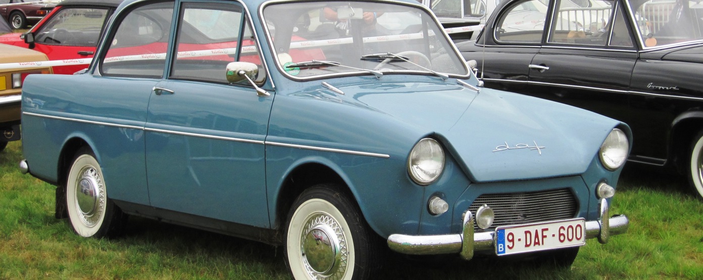 A blue DAF parked at a classic car show