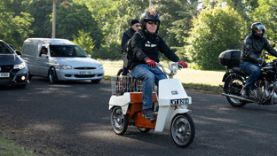 header-senior-man-on-a-bsa-ariel-3-3-wheeled-scooter